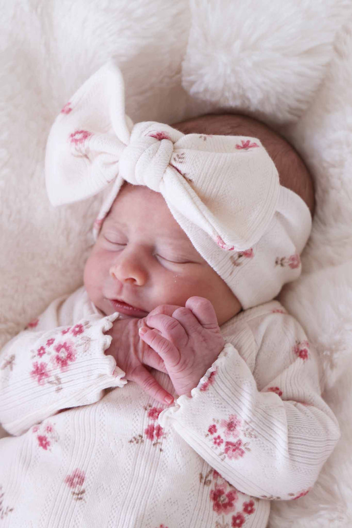 closeup of pointelle vintage floral headwrap for baby girls 