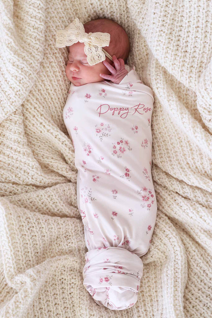 baby girl wrapped in precious posies personalized swaddle blanket 