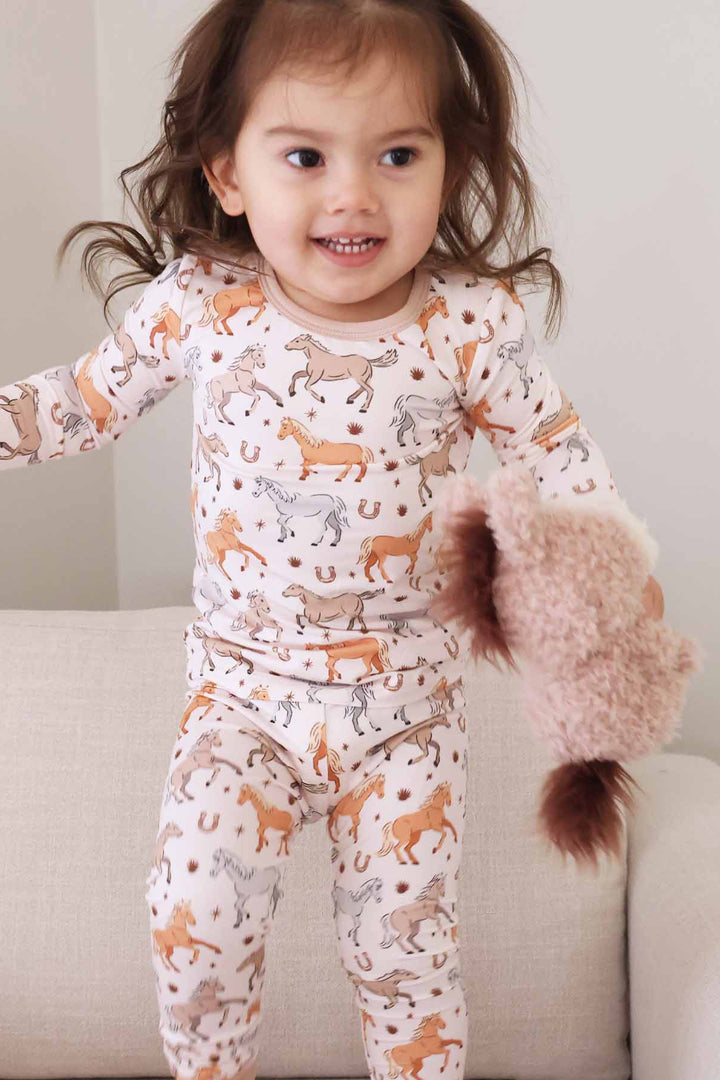 girl's pajamas with ponies and horses print for toddlers - caden lane