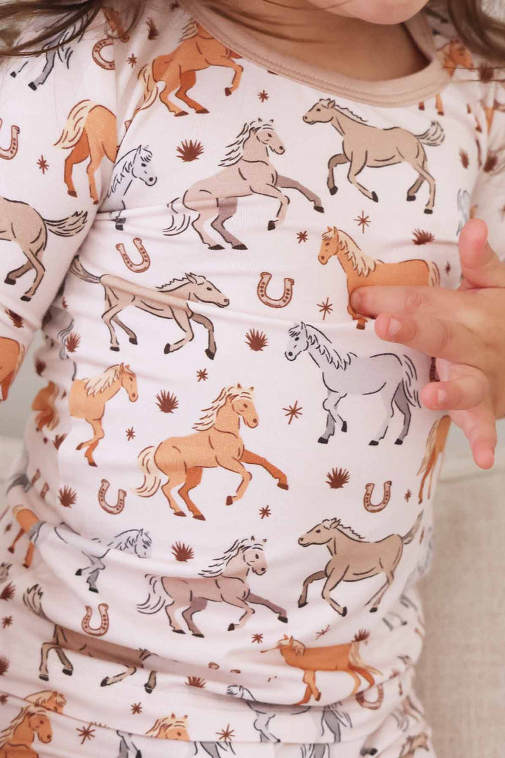 toddler girl pajama set with ponies and horses print for sleep - caden lane