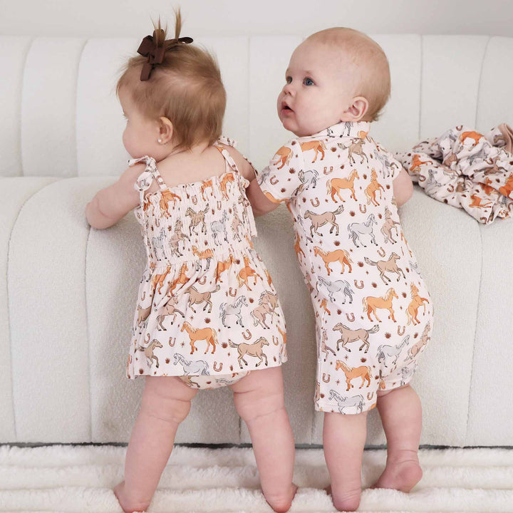 pony print dress and short romper for babies