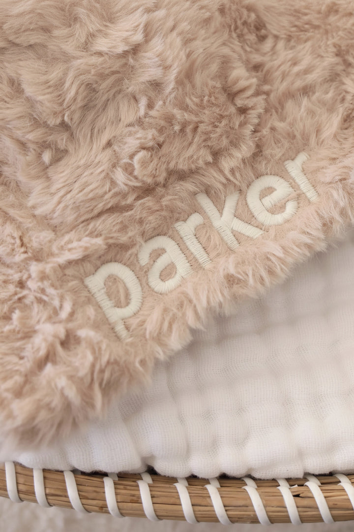 embroidered fluffy puppy lovey for babies with white block font 