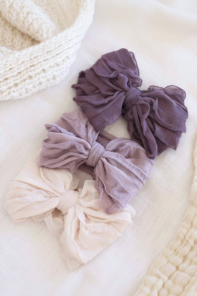 large ruffle knit bow purples 