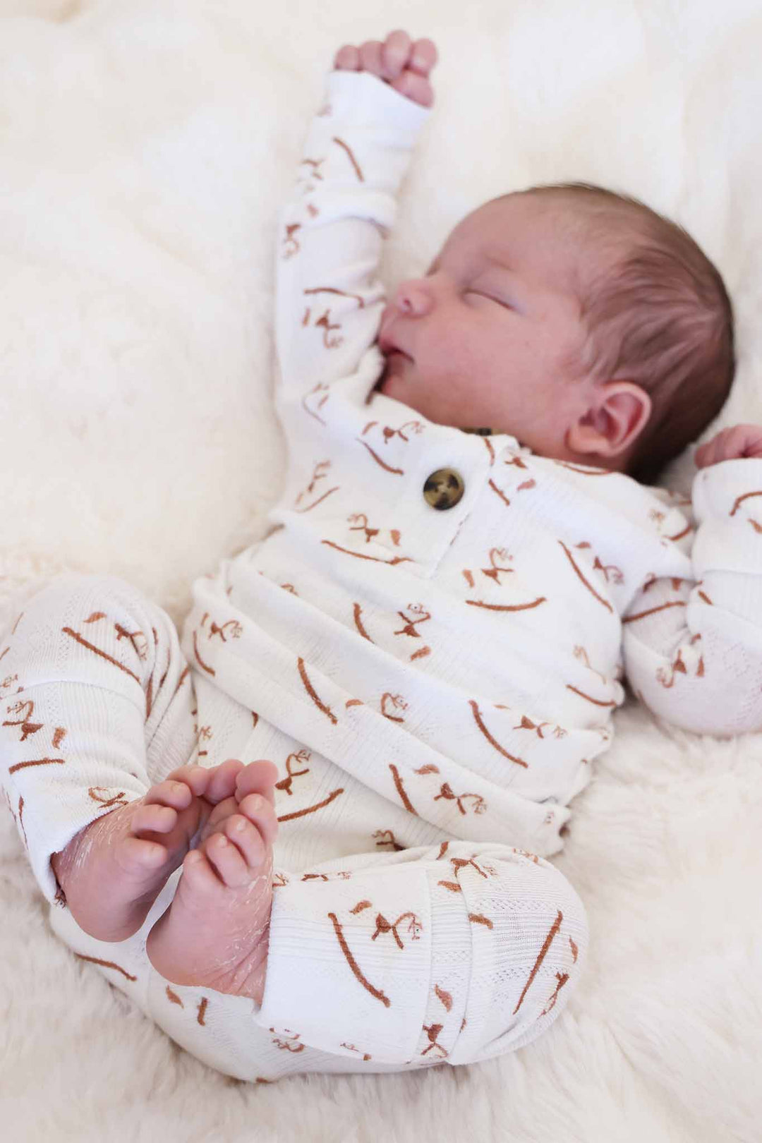 neutral rocking horses outfit for baby boys with pointelle knit design 
