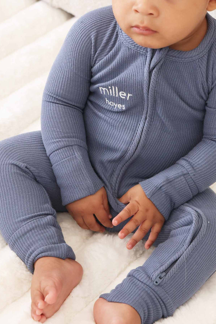 blue personalized bamboo waffle convertible zip romper embroidered with first and middle name in white thread 