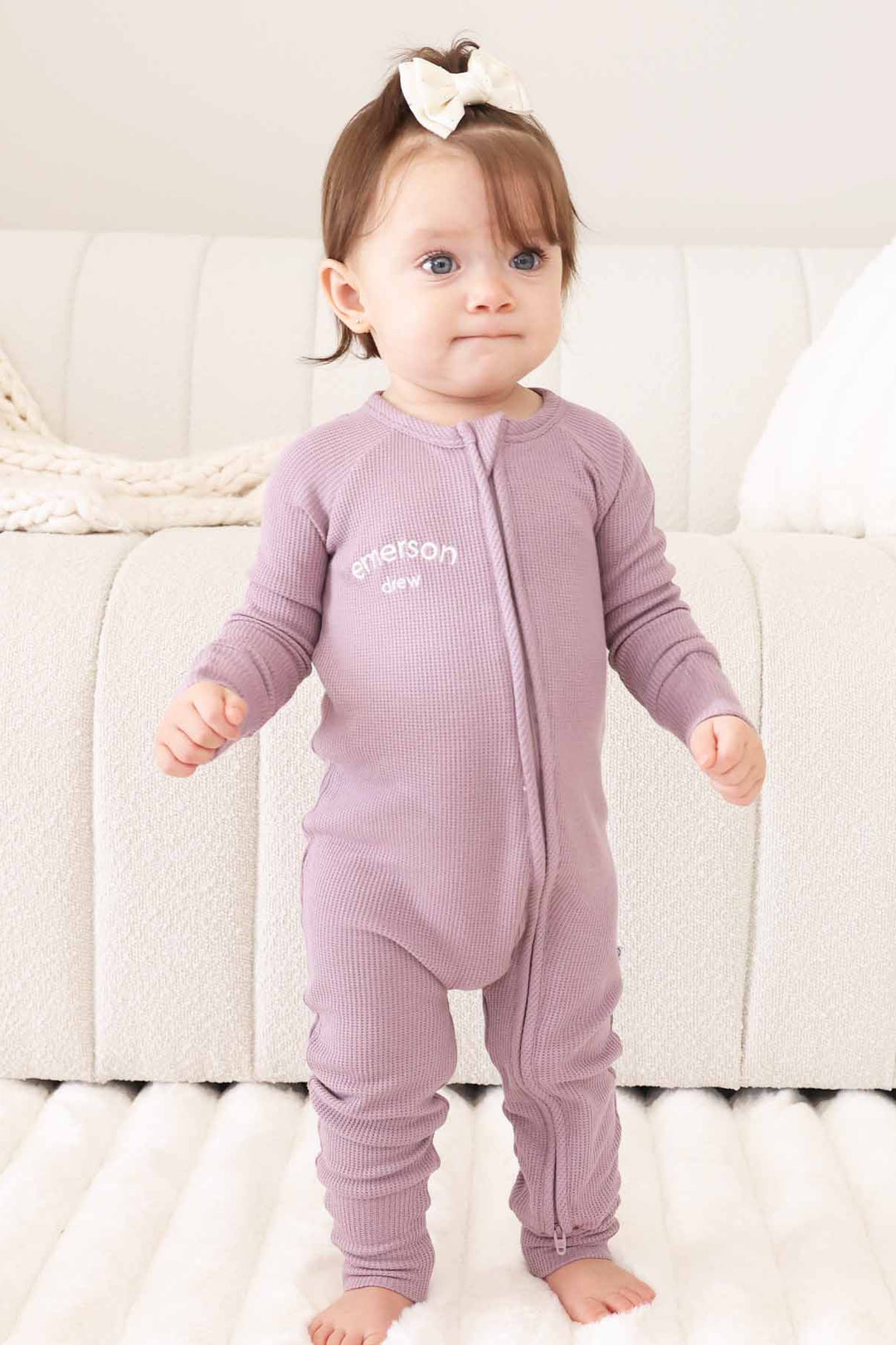 purple embroidered zip romper for babies and toddlers 
