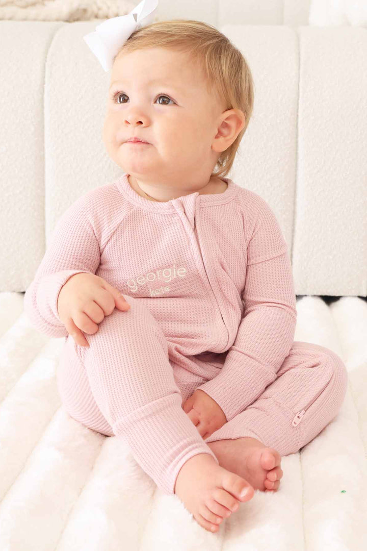 convertible zip romper pajama for babies and toddler light pink embroidered with first and middle name 