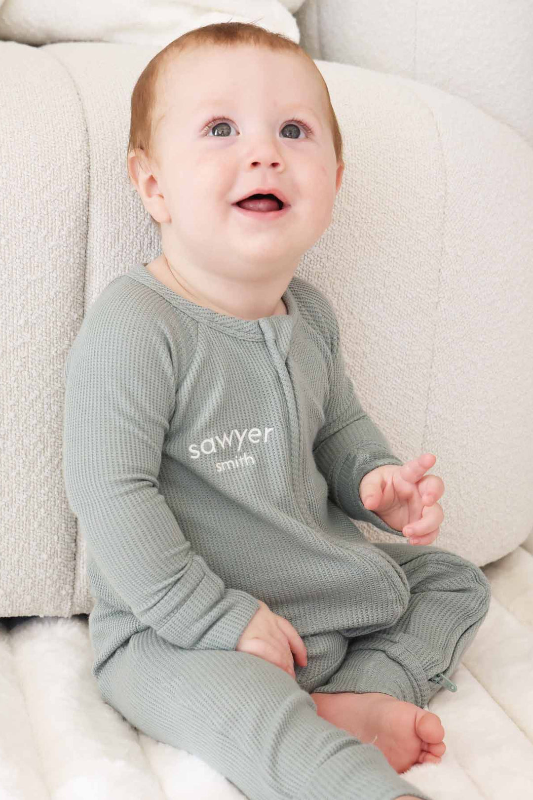 light green embroidered name convertible zip romper for babies and toddlers gender neutral