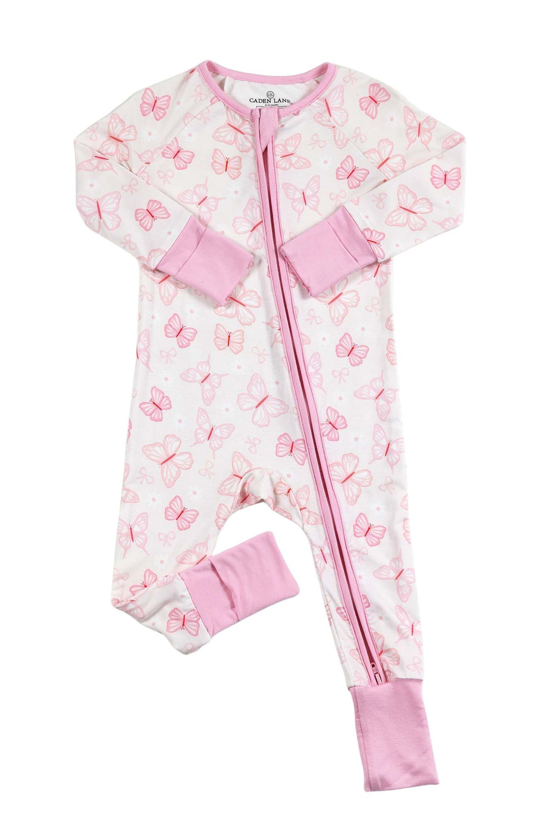 Convertible Zip Romper in Blooming Butterflies print - flat lay product shot showing the full romper with double zipper, pink cuffed wrists and ankles, and butterfly print on white