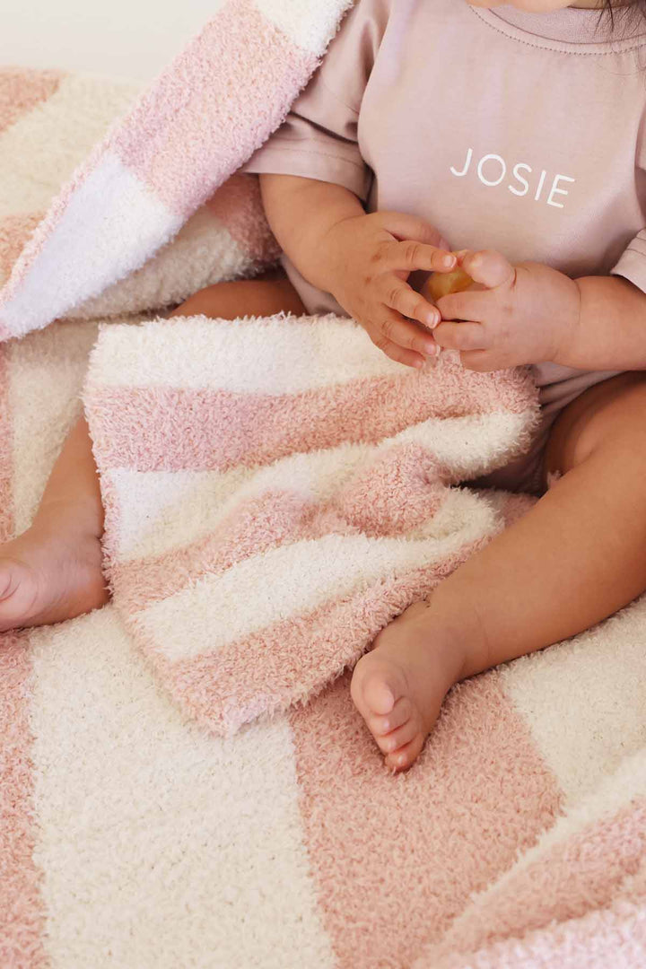 pink and and white stripe cuddlelane luxe blanket and matching lovey for babies 
