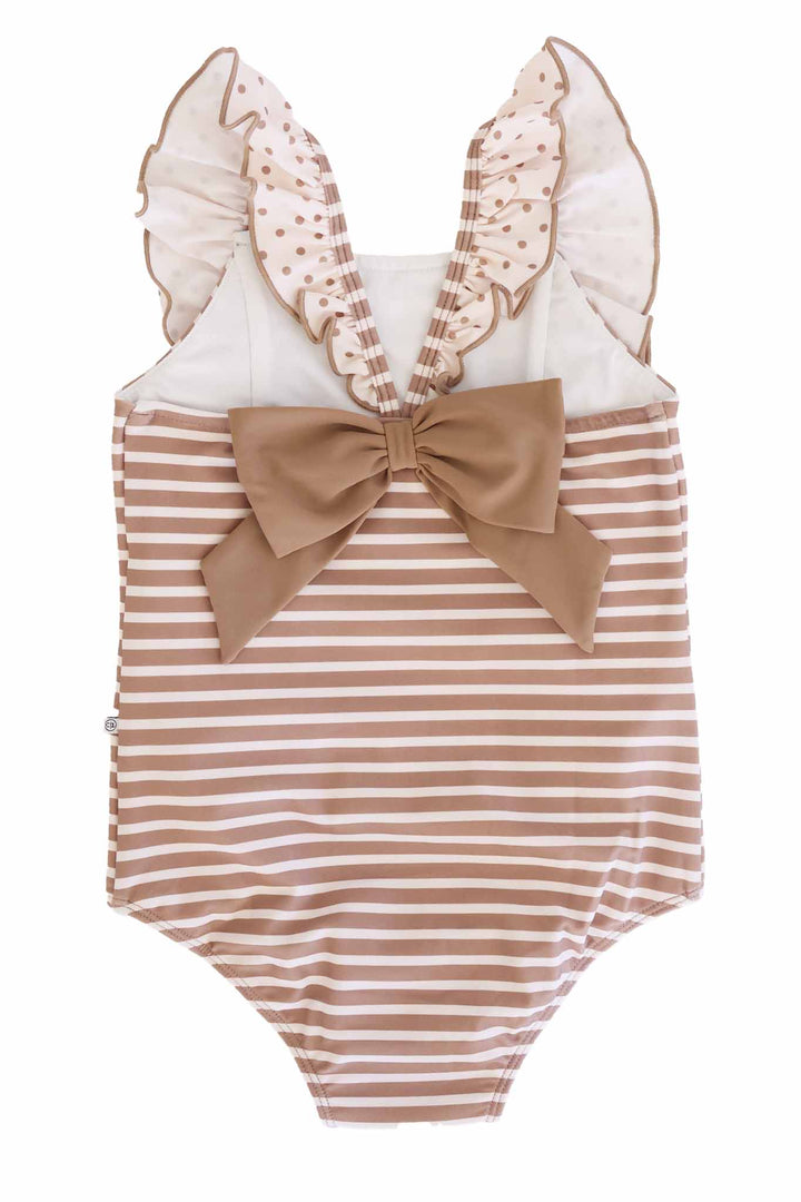 back view of neutral stripe and polka dot ruffle swimsuit for girls with brown bow bow on the back 