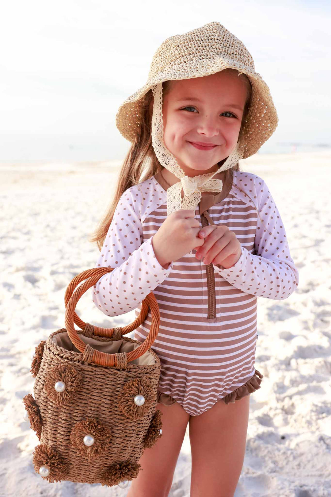 sandy stripes long sleeve front zip rash guard romper with ruffles on the hips 
