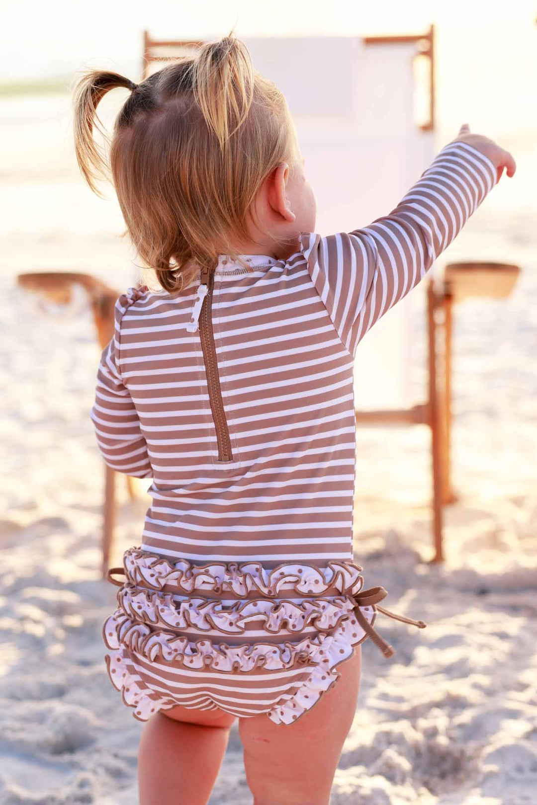 sandy stripes ruffle bottom rash guard swimsuit 