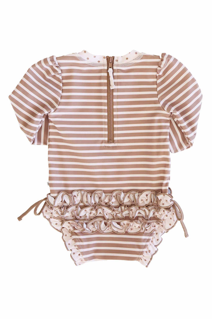 back view of sandy stripes ruffle bottom rash guard romper 