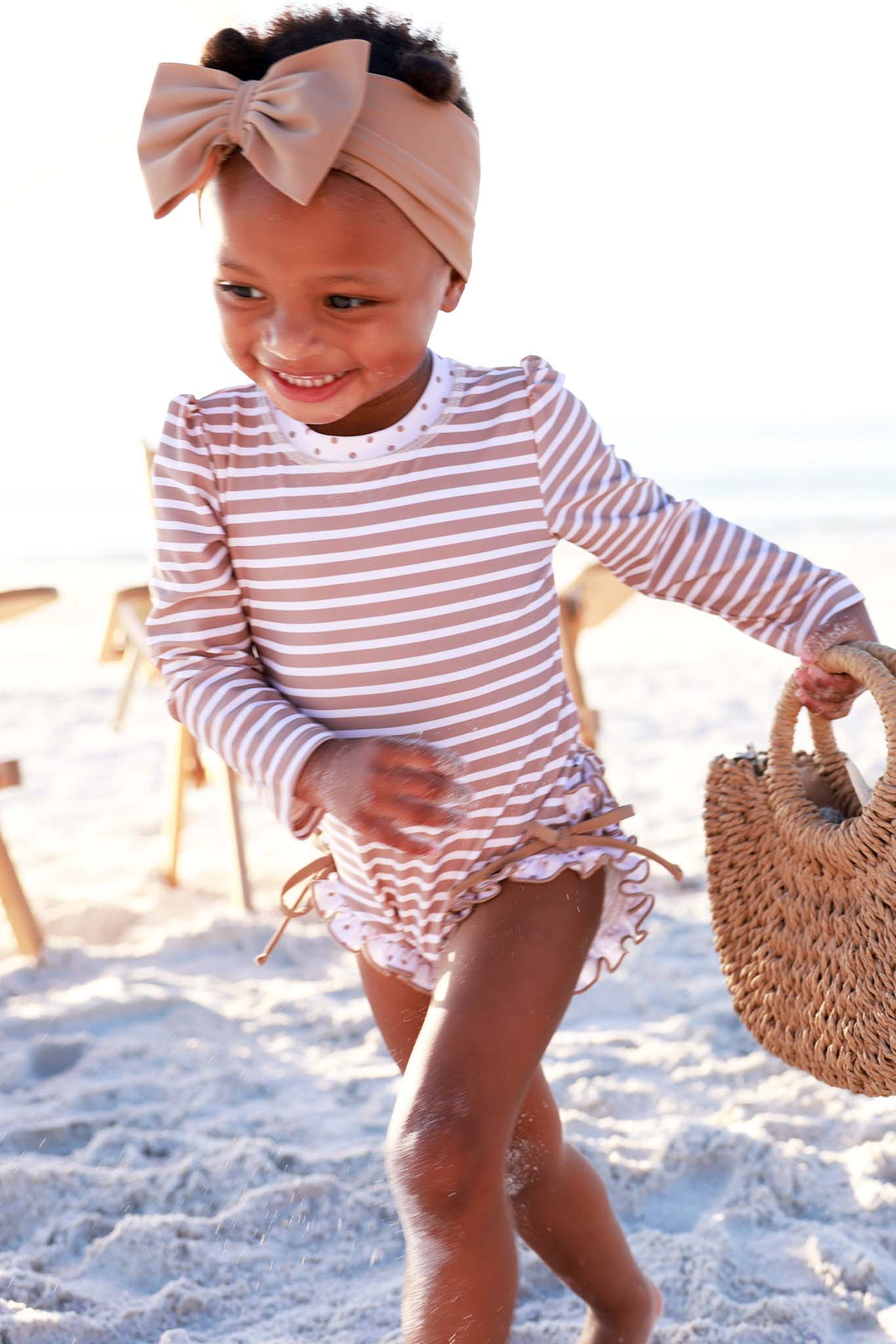 sandy stripes ruffle bottom long sleeve rash guard swimsuit for baby and toddler girls 