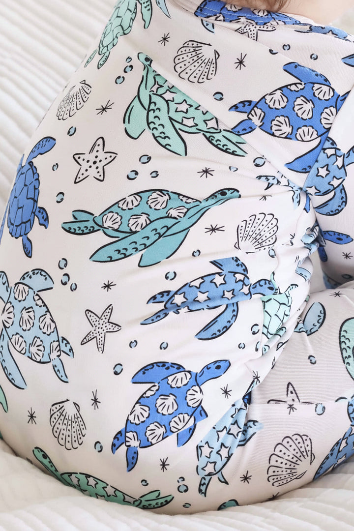 blue and green turtle baby zipper footie 