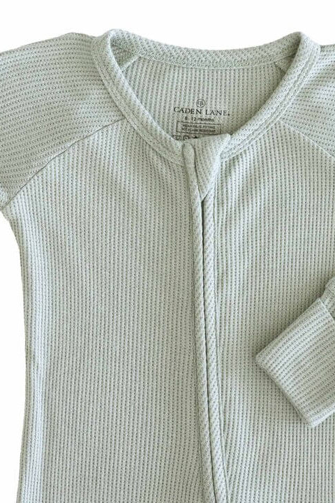 baby zip romper light green