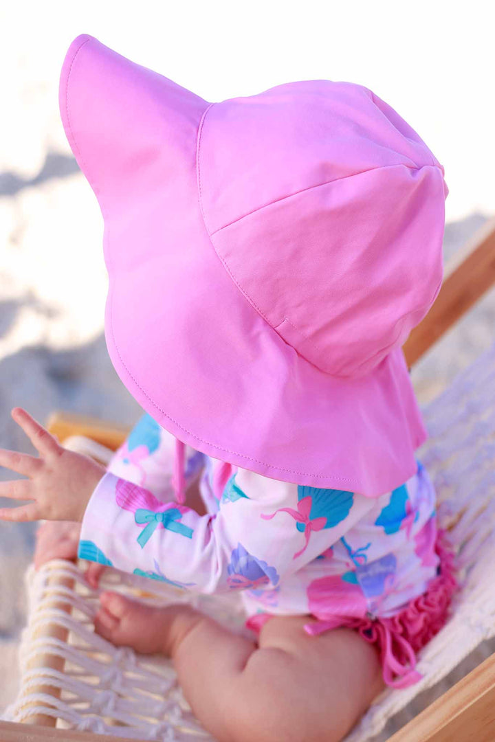 side view of seaside sweetie solid pink sun hat 