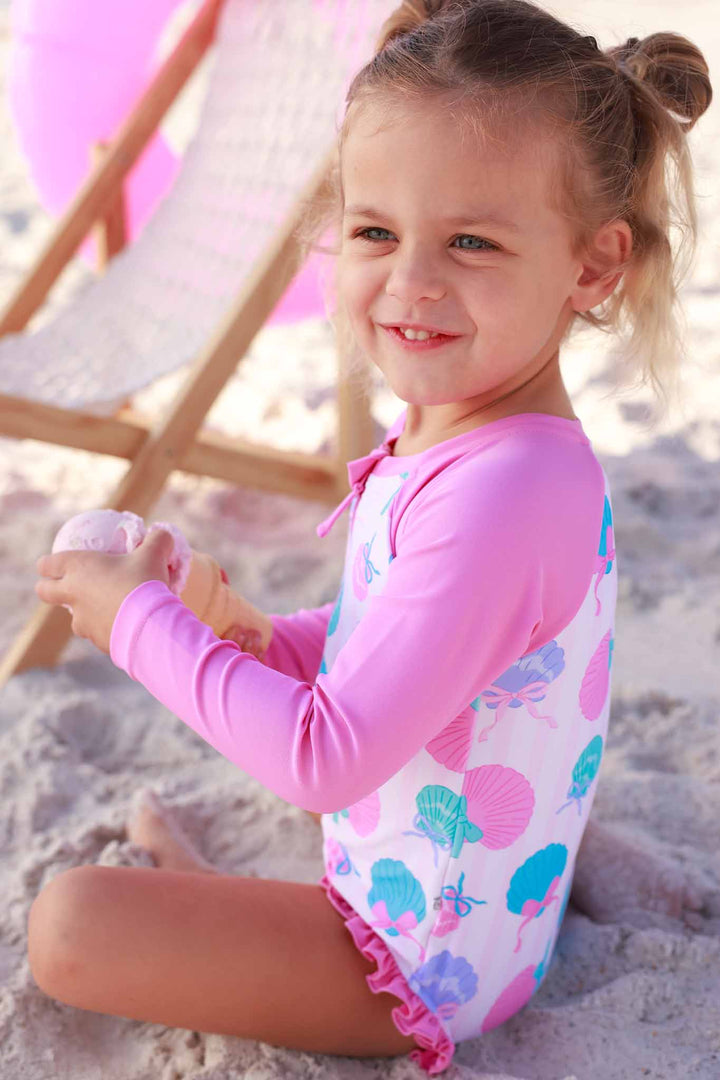side view of seaside sweetie rash guard swimsuit for girls 