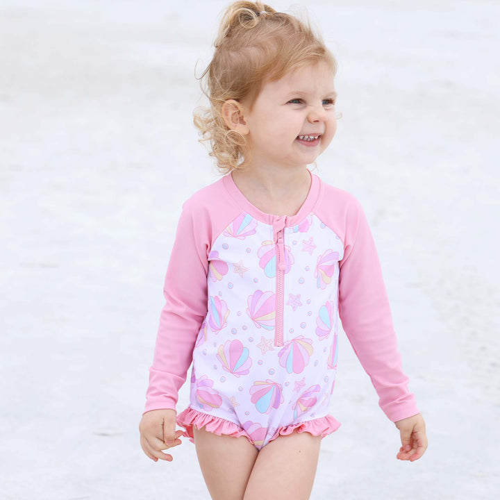 baby swimsuit with pink seashells and long sleeve 