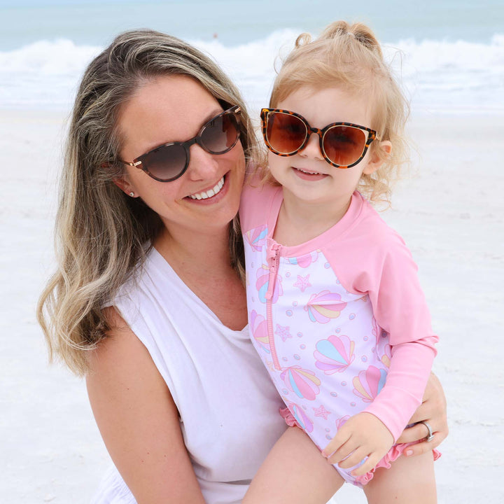 pink seashell long sleeve rash guard romper for babies 