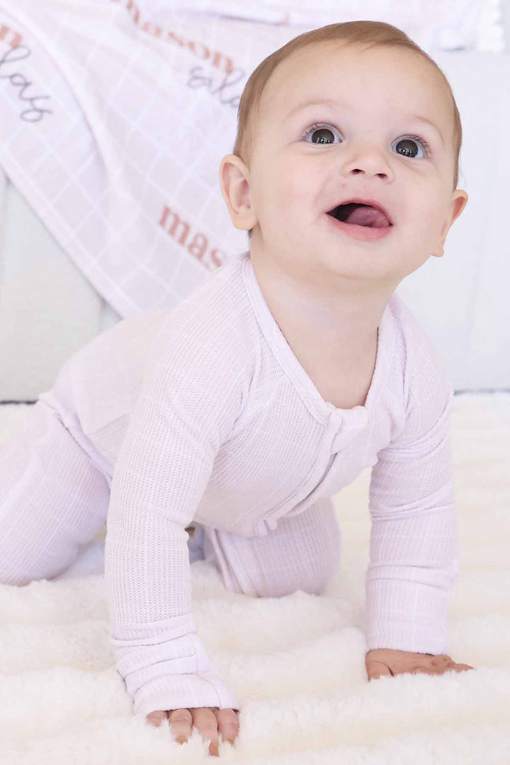 neutral pajama romper for babies sloane's squares