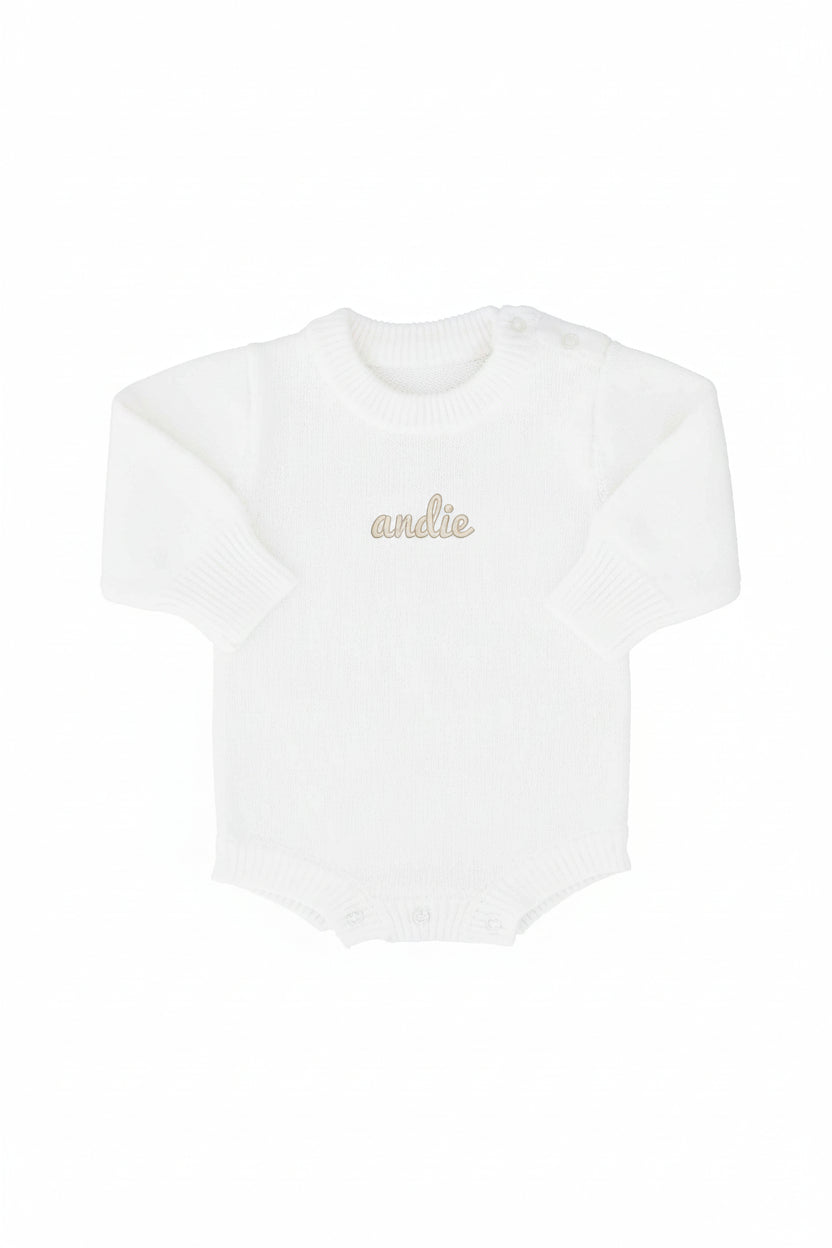 white embroidered knit bubble romper with script font 