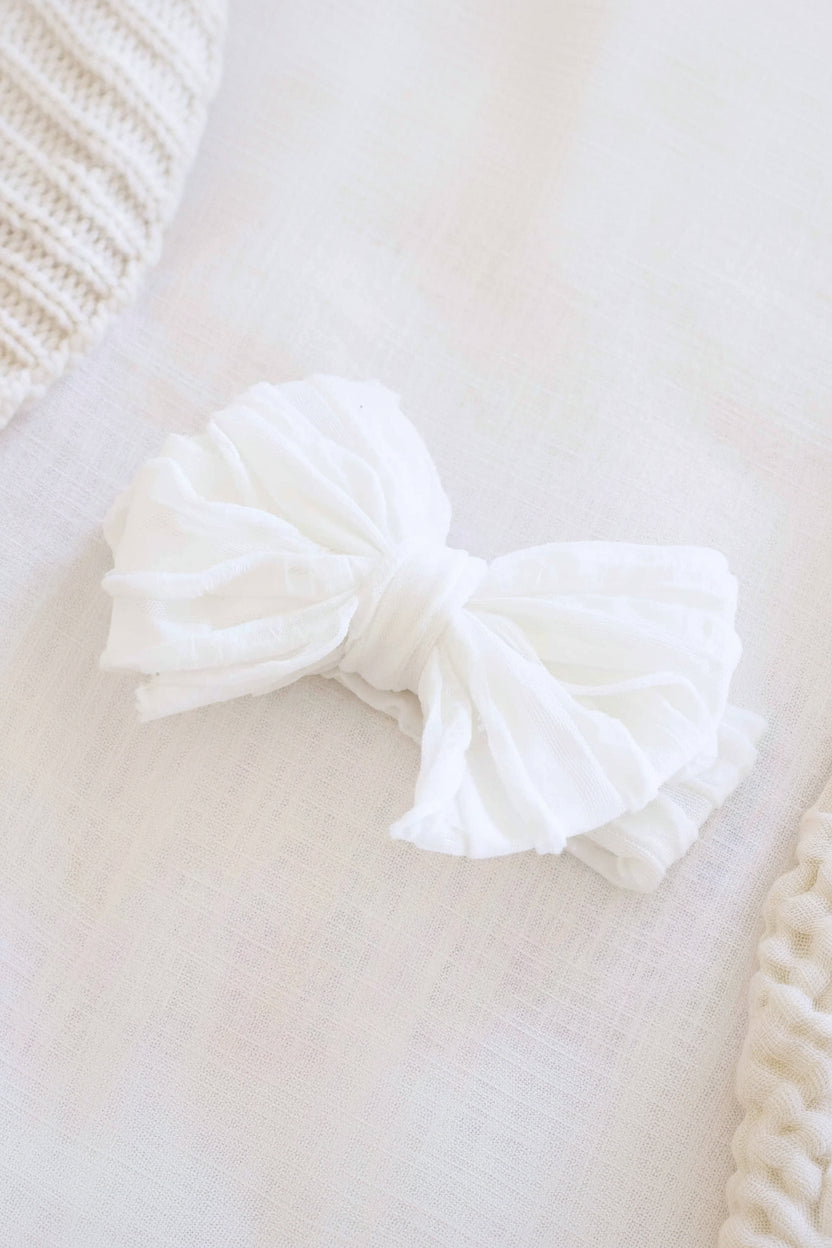 snow large ruffle knit bow