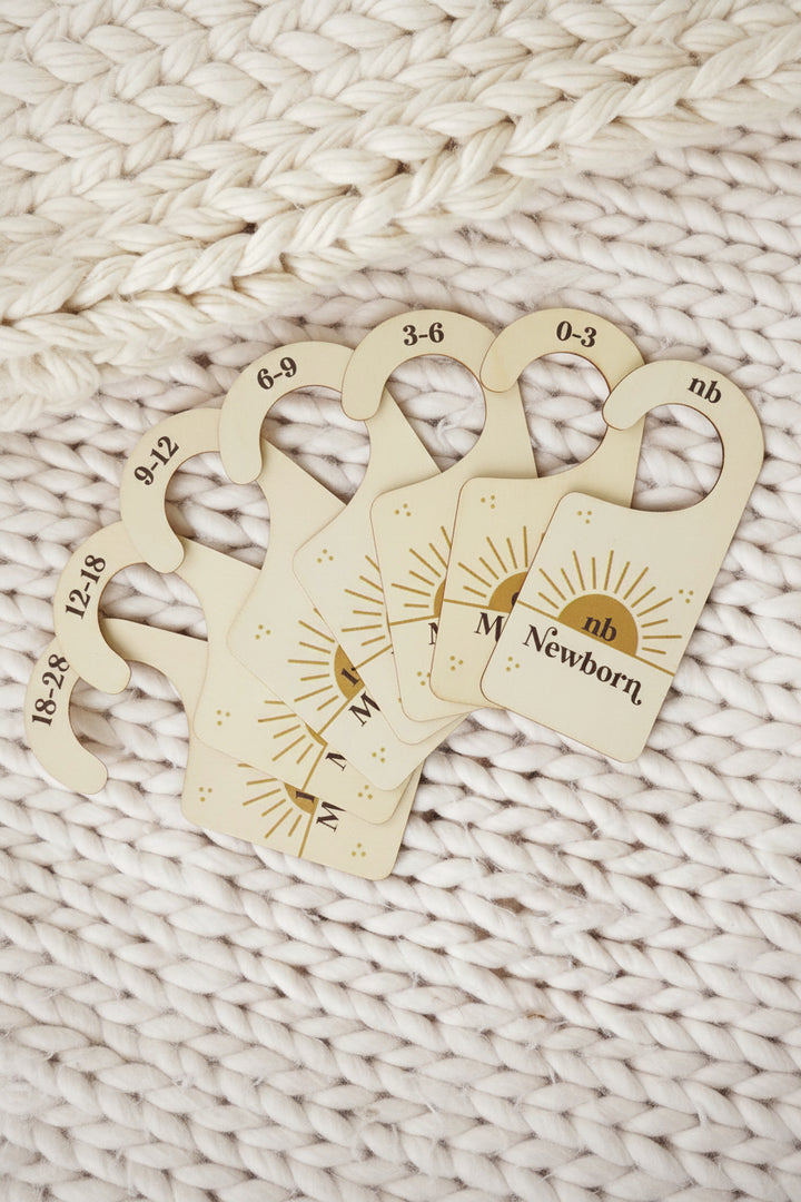 wooden nursery closet dividers with suns 