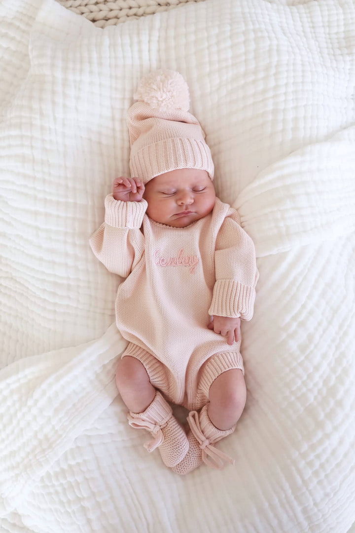 pink newborn girl outfit with matching beanie and booties