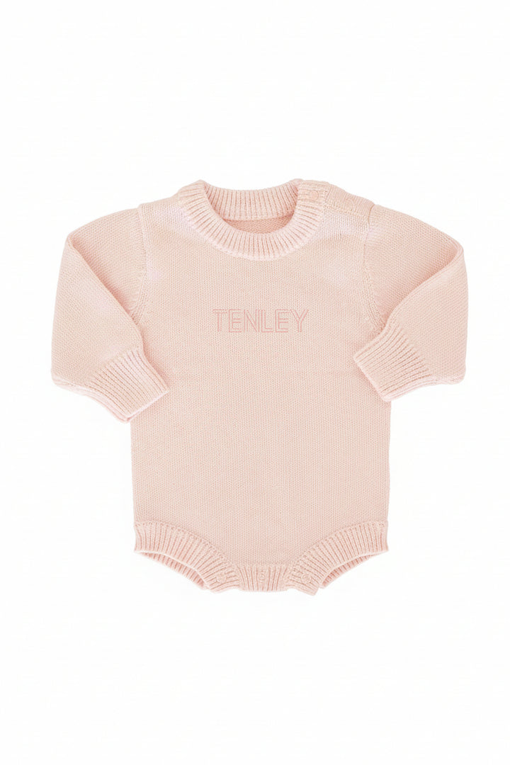 light pink embroidered bubble romper with block font 