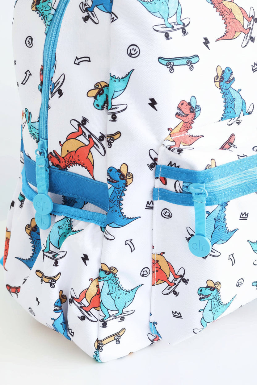 boy's back to school backpack with skateboarding dinosaurs and blue zippers 