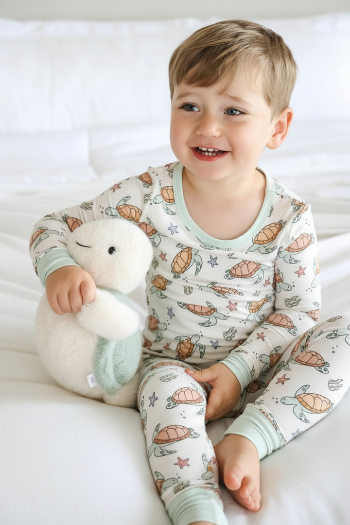 baby wearing turtley rad bamboo two piece pajamas – turtle print sleepwear for little ones