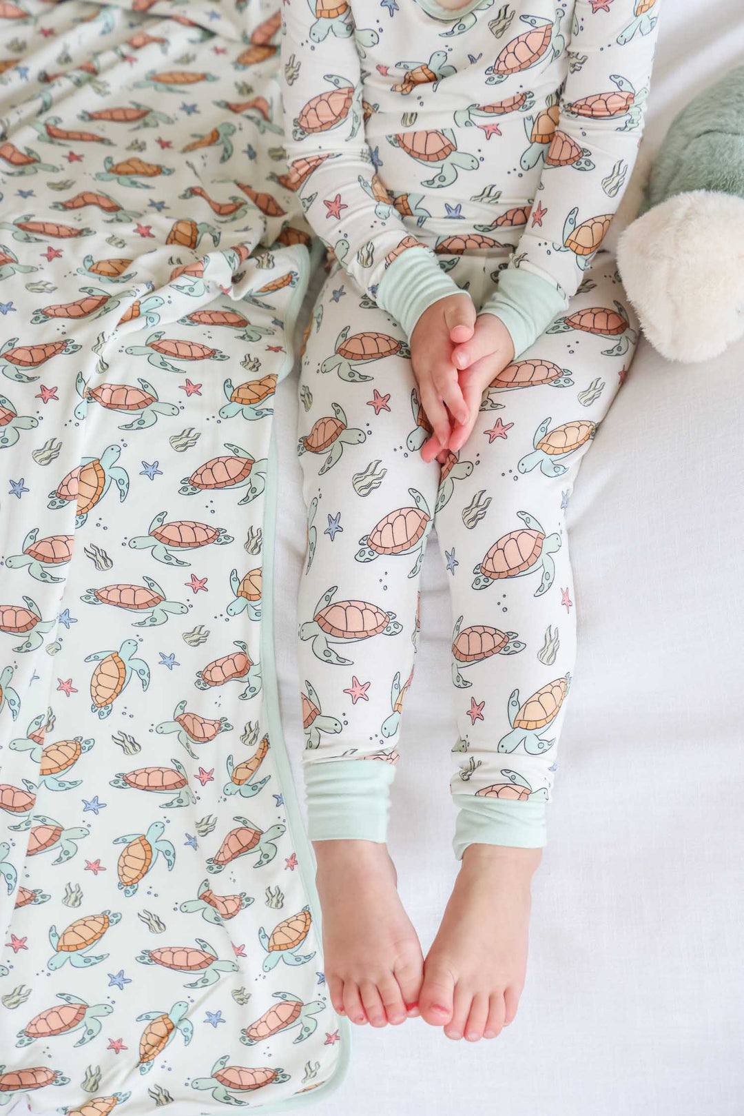 turtle print detail on bamboo – soft and breathable baby sleepwear fabric