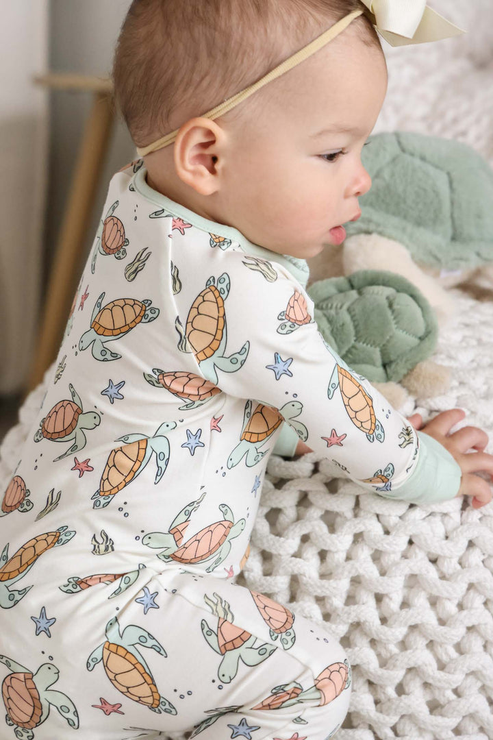 baby wearing turtley rad bamboo convertible zip romper – turtle print sleepwear for little ones
