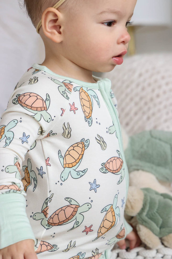 turtle print detail on bamboo – soft and breathable baby sleepwear fabric