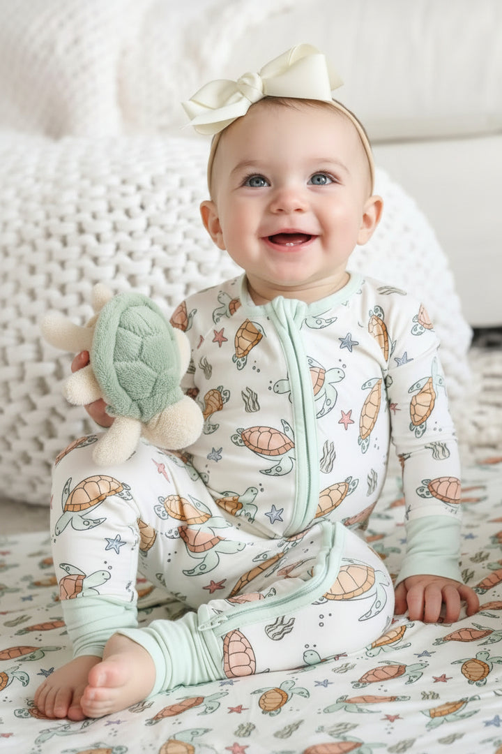 close-up of turtley rad turtle print on bamboo fabric – playful gender neutral design