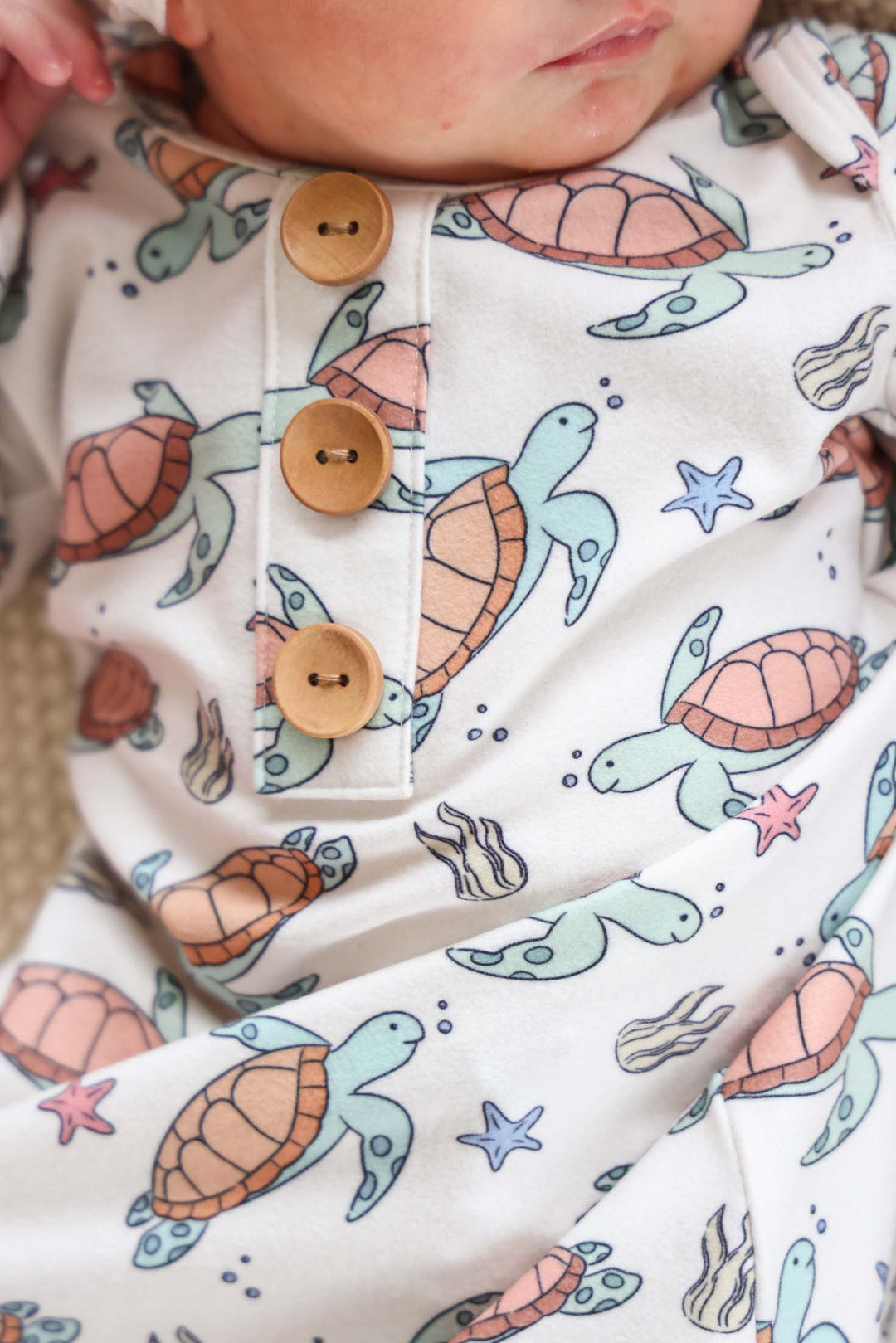 turtle print detail on bamboo – soft and breathable baby sleepwear fabric