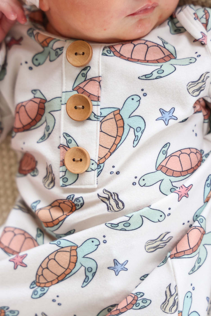 turtle print detail on bamboo – soft and breathable baby sleepwear fabric