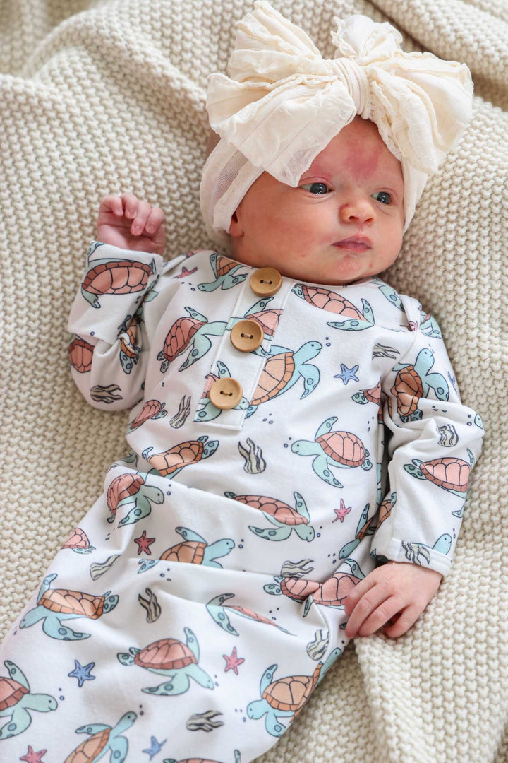 newborn baby knot gown and hat set with turtley rad turtle print in bamboo