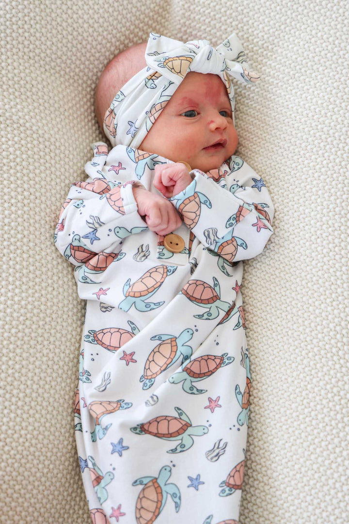 close-up of turtley rad turtle print on bamboo fabric – playful gender neutral design
