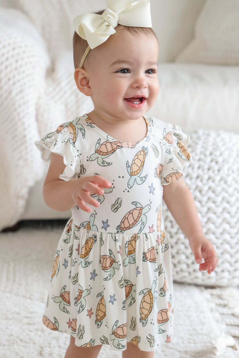 turtle print detail on bamboo – soft and breathable baby sleepwear fabric