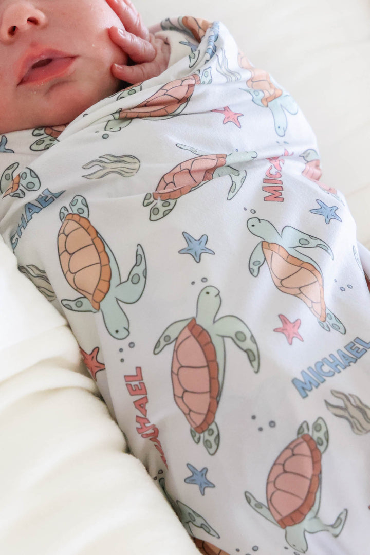 turtley rad personalized swaddle in bamboo – soft turtle print with name