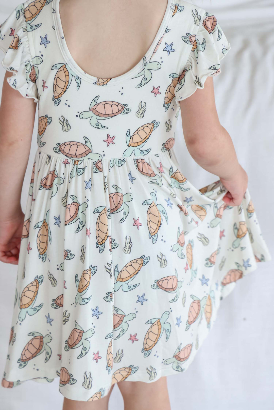 turtle print detail on bamboo – soft and breathable baby sleepwear fabric