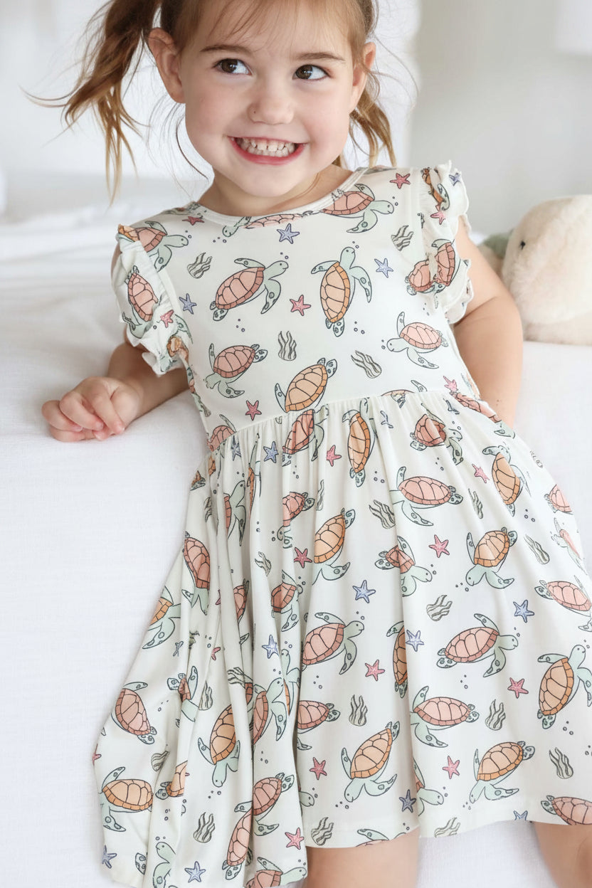 turtley rad ruffle twirl dress in bamboo with turtle print
