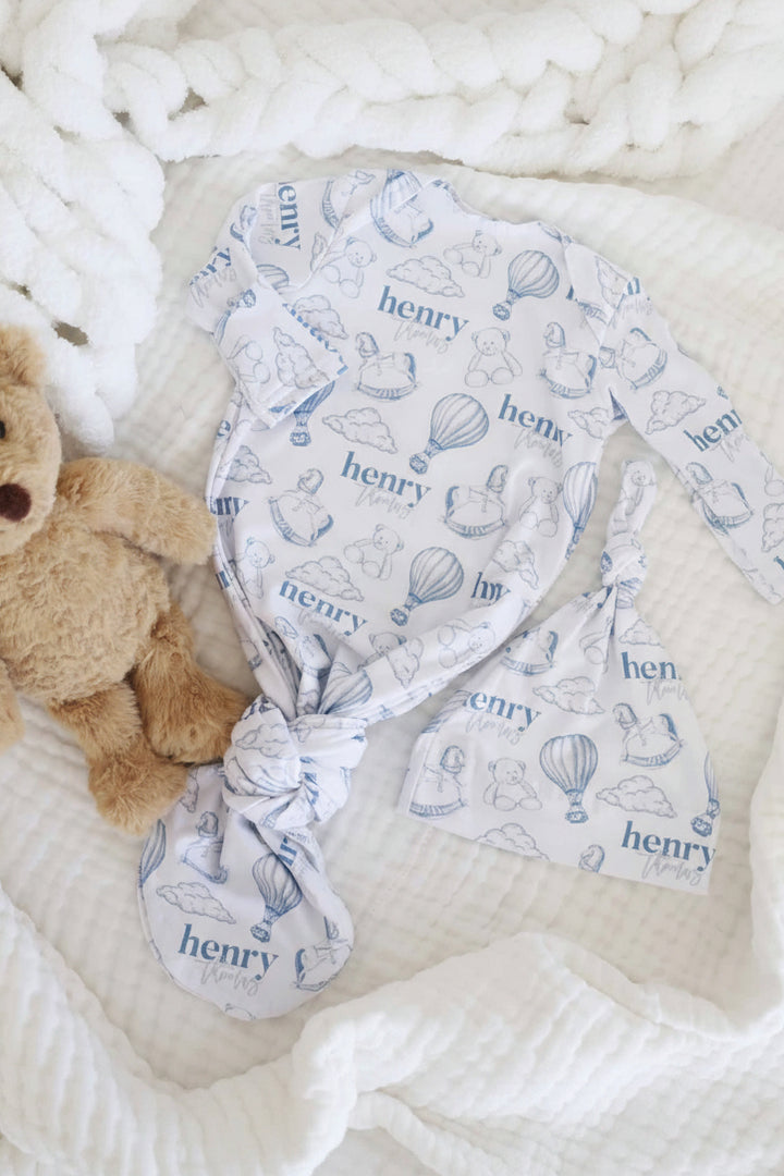 boy personalized newborn baby knot gown white with dusty blue teddy bears, hot air balloons, and rocking horses