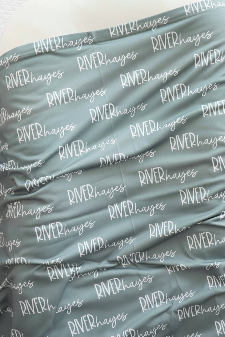 vintage green personalized swaddle 