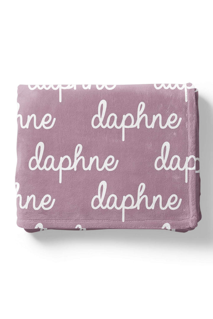 violet personalized name blanket in script font