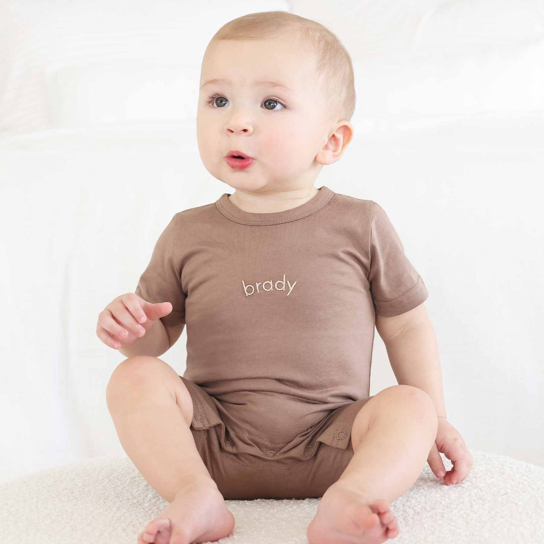 walnut short sleeve and shorts embroidered snap romper for baby and toddler boys 