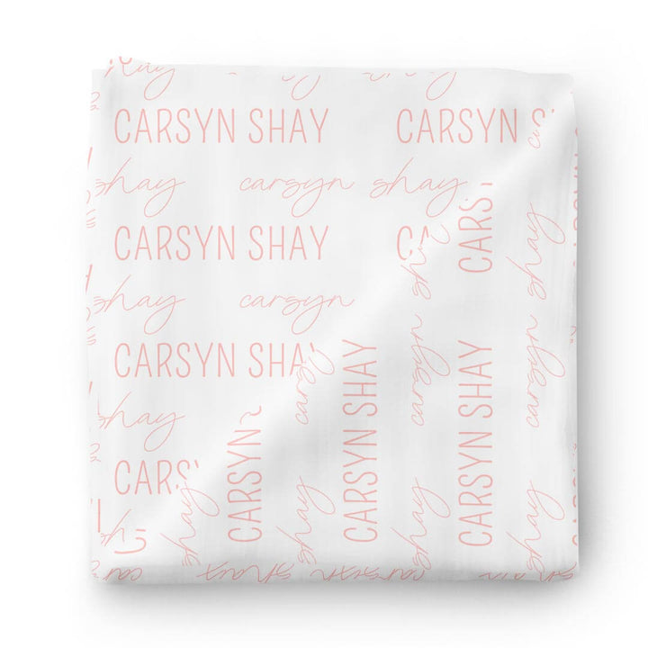 pink on white personalized swaddle blanket 